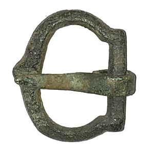 A close-up of a D-shaped metal buckle